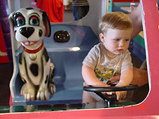 Hunter riding with a Dalmation.