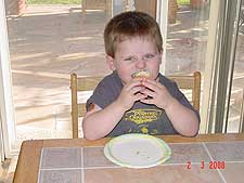 Hunter gets to enjoy his cupcakes.